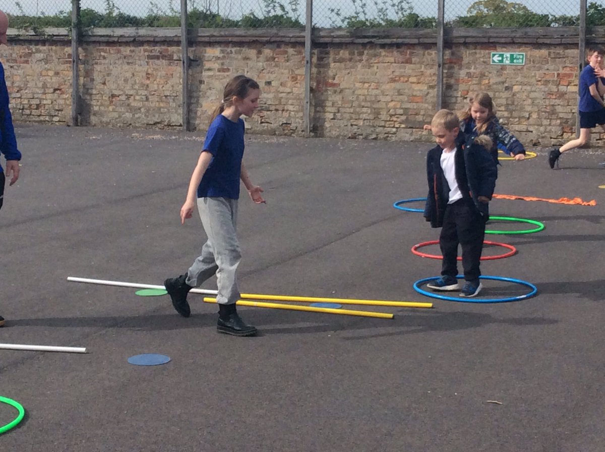 Sports Council are in charge of Multi Sports Club tonight.  They’ve created a fantastic real life ‘Frogger’ game and everyone is busy hopping from log to log and avoiding cars!