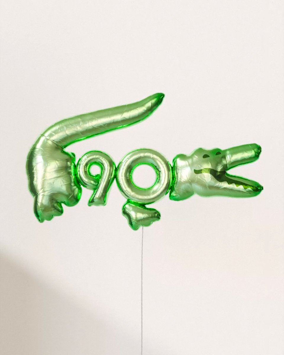 Lacoste's tweet photo. The crocodile is turning 90! 🐊🎈

#LacosteCelebrates90 https://t.co/GUY3nsffmZ