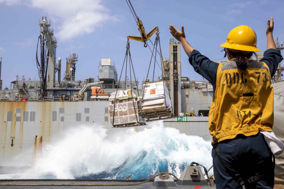 To the amazement of those around her, the sailor summoned the ocean and sent waves crashing into the ship. 😋 Kidding aside Petty Officer 3rd Class Sheila Martinez signals during a replenishment aboard the USS Decatur. Photo by PO2 David Negron #ussdecatur #USNSWashingtonChambers
