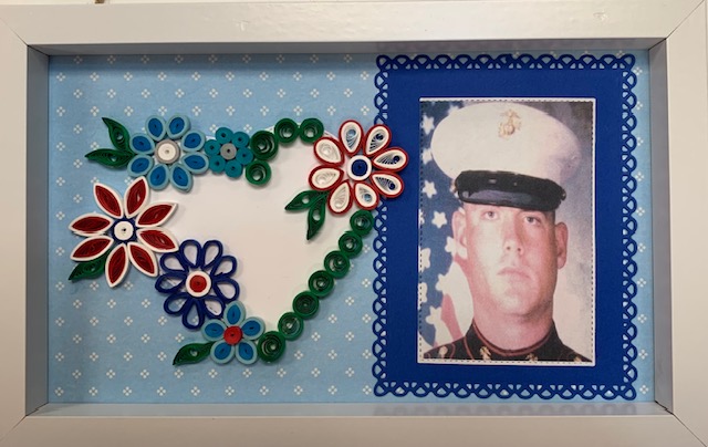TAPSorg's tweet photo. A recent TAPS Togethers event in Edmond, OK, brought military survivors together to learn the centuries old art of #quilling. Everyone created a framed piece of art featuring a photo of their fallen hero. Thank you to #ARWorkshop for hosting this time of crafting & connection! https://t.co/XI00nxfv2p