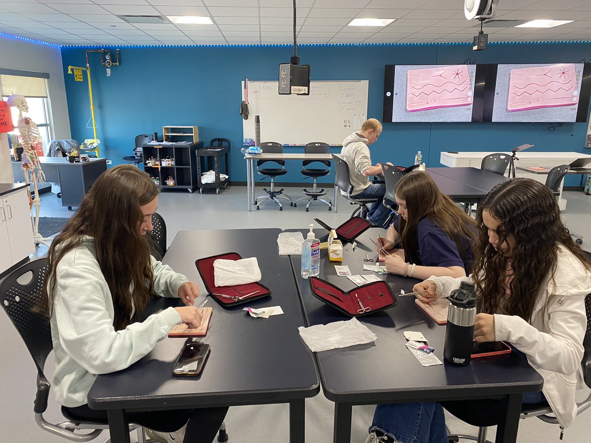 Dr. Andrea Belcher came in again for her annual Suturing 101 crash course for Honors Medical Interventions today! #futuresurgeons #MCHSbiomed <a href="/MCHS156/">McHenry</a> <a href="/McHenrySci/">MCHS Science Department</a> <a href="/PLTWorg/">Project Lead The Way</a>