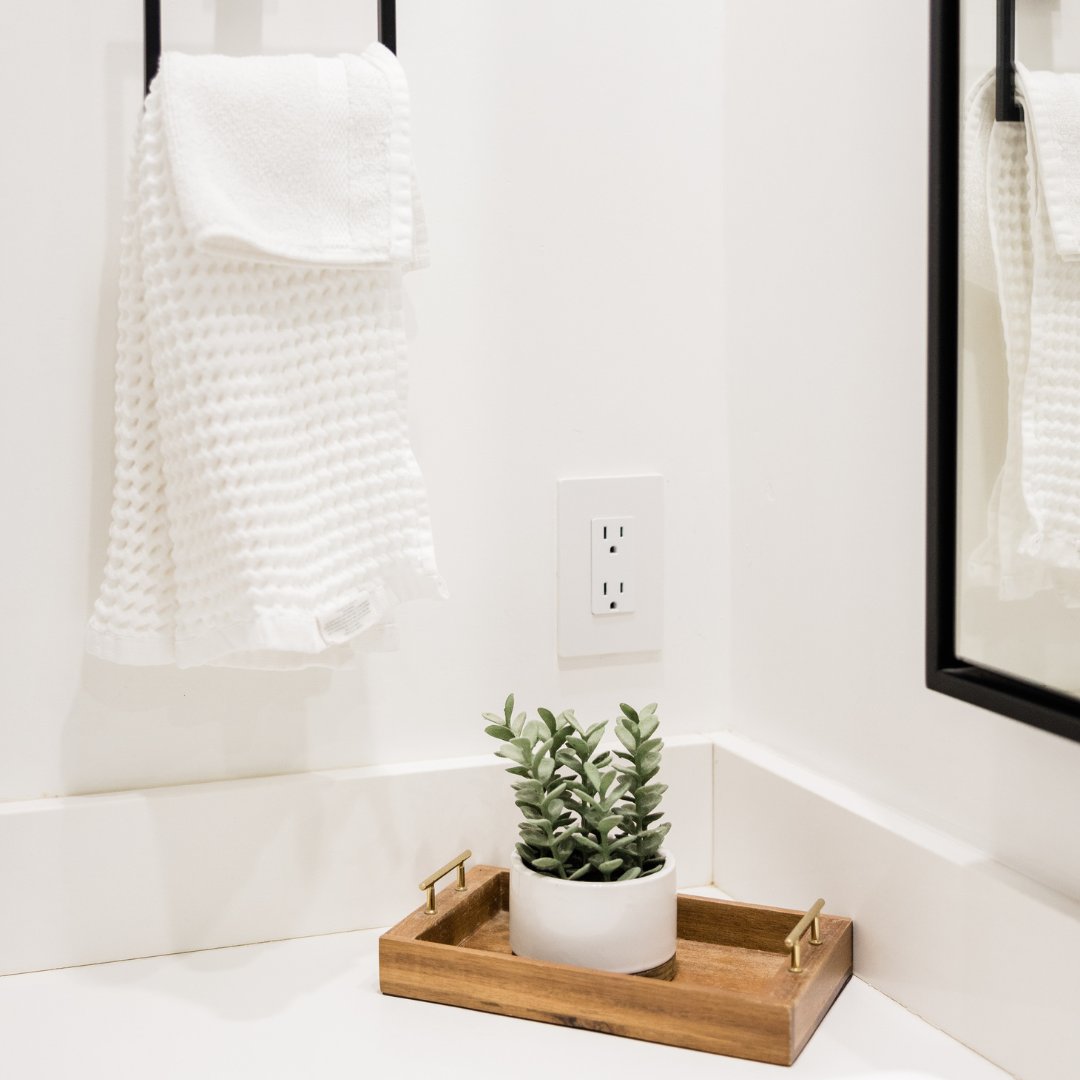 When giving your home a Spring refresh, don’t just decorate the living room and dining room! Freshen up your bathroom with a floral shower curtain or a new houseplant to tie together your summertime space.