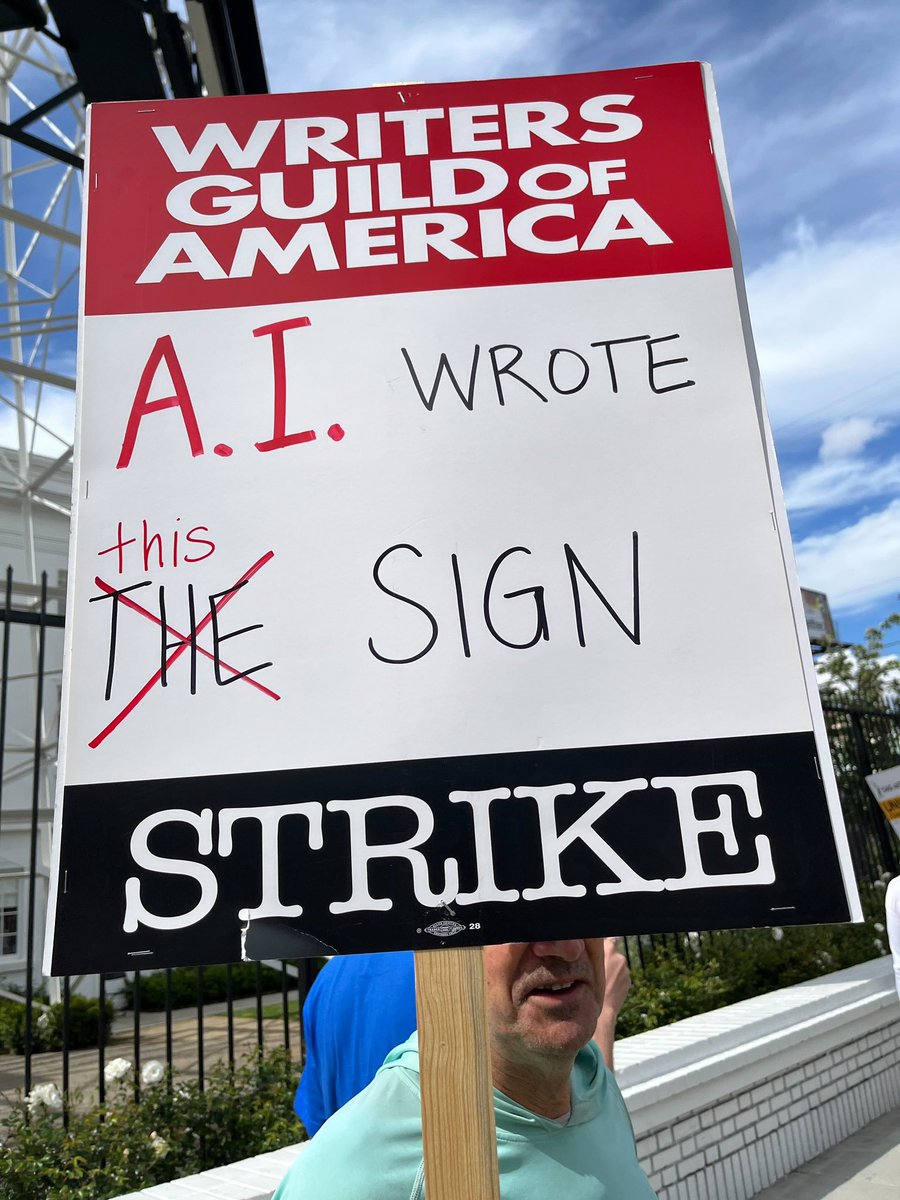 Variety's tweet photo. Writers and supporters picket outside the Netflix building in Hollywood on Day 2 of the strike. https://t.co/DDAKv2oZVo https://t.co/xjH9Pfg0ZV
