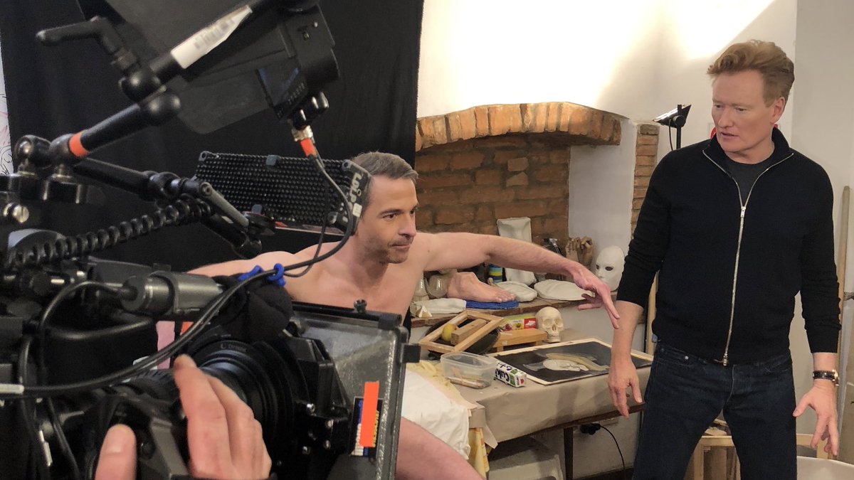 TeamCoco's tweet photo. On #INSIDECONAN, Mike and @jessiestwats are talking to #CONAN OGs Jordan Schlansky, Jason Chillemi, and Frank Smiley. They discuss the Italy trip, Jordan's foray into nude modeling, and the importance of thinly sliced prosciutto. 🇮🇹 Listen: https://t.co/mT2Wa3Un5d https://t.co/iETyLZBZn9