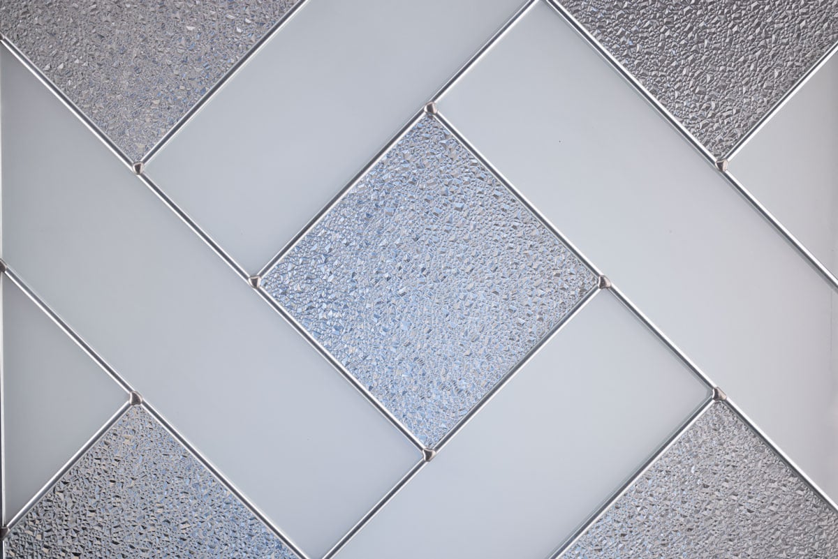 Margate's frosted glass and platinum caming cross between sparkling granite textures to create a maximum level of privacy and a stand-out first impression.