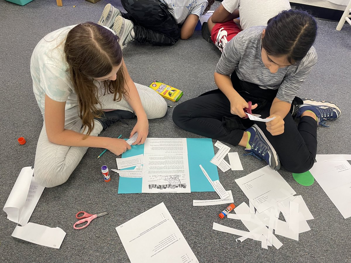 Students work together to place questions next to evidence in the text!