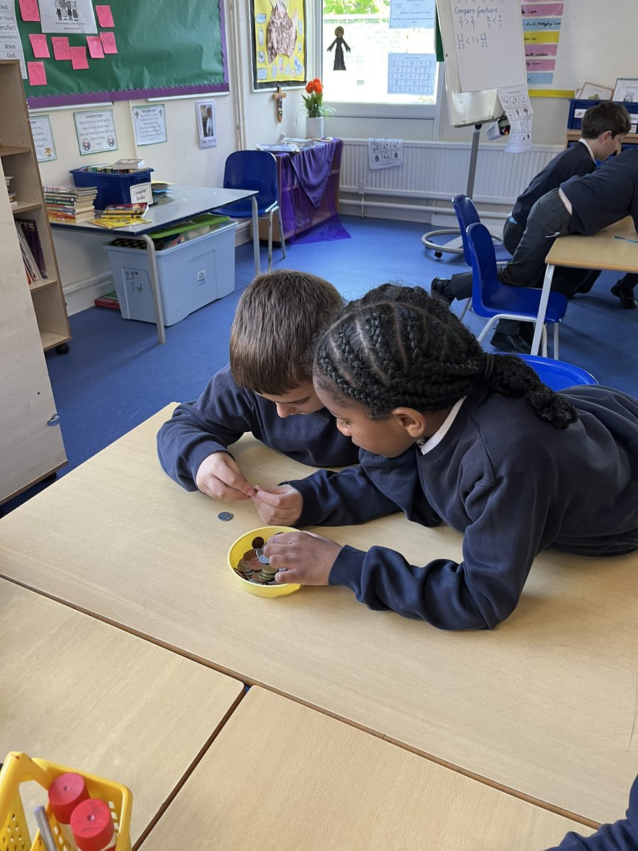 Y3SaintFrancis's tweet photo. A practical lesson learning about money! We were able to use different combinations of coins to make amounts. We also practised more efficient ways of adding and subtracting money. #mathsstannesgae1 @StAnnesgaCPS https://t.co/f8jC54H6zf