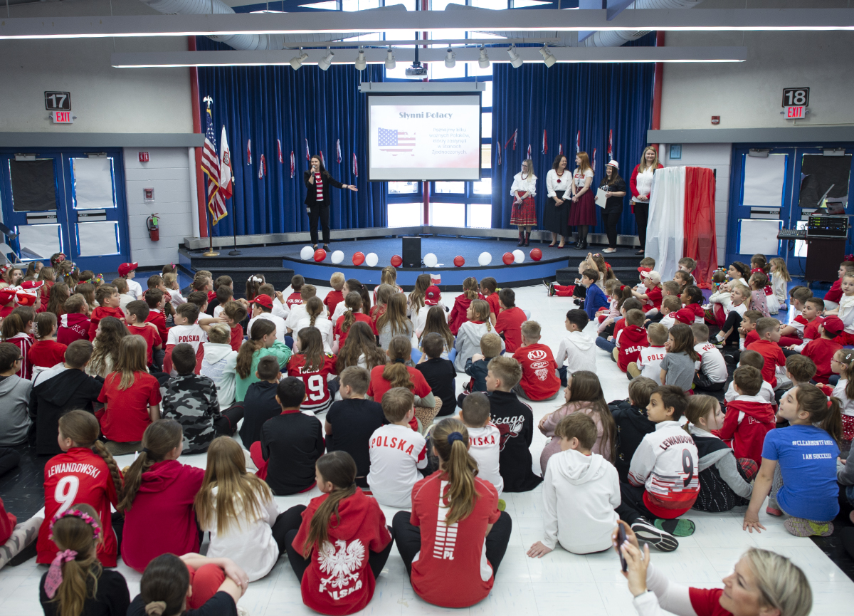 CCSD59's tweet photo. Polish Dual Language students and staff at Clearmont Elementary gathered for their annual celebration of Polish Constitution Day on Wednesday. 

Staff led students in singing, shared Polish history and heritage, took part in trivia, and more: https://t.co/yFUUd7q0MA https://t.co/u88nowfVDv