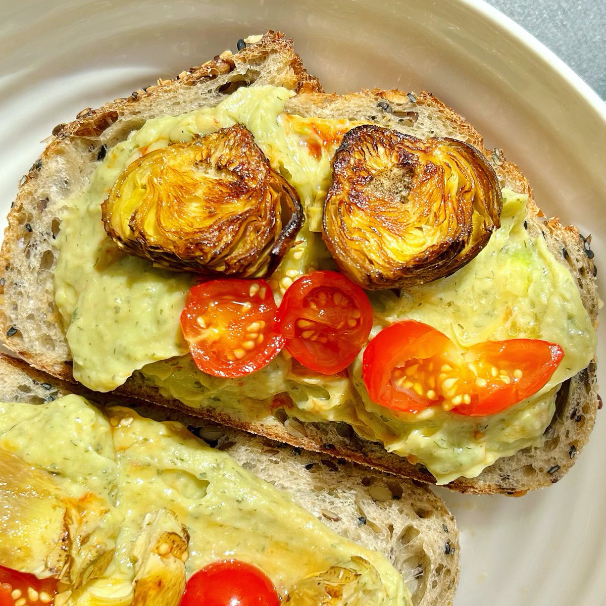 Bára (@barboratde) on Twitter photo Swift and delicious dinner - seeded rye sourdough with avocado and butter bean dip with fried artichokes and <a href="/Olia_Hercules/">Olia Hercules 🇺🇦🇬🇧</a>’s chilli paste and fermented tomatoes.
#cookforukraine #standwithukraine Swift and delicious dinner - seeded rye sourdough with avocado and butter bean dip with fried artichokes and <a href="/Olia_Hercules/">Olia Hercules 🇺🇦🇬🇧</a>’s chilli paste and fermented tomatoes.
#cookforukraine #standwithukraine