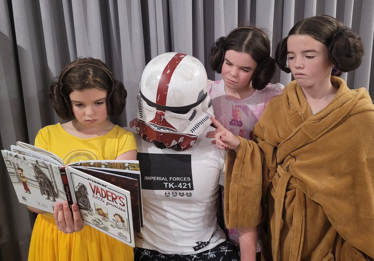 reschsreal's tweet photo. Stormtrooper reading time with the padawans. Very hard when you  can't see anything in this helmet. Any tips @MarkHamill ?
#MayThe4thBeWithYou https://t.co/q09OLVDZkp