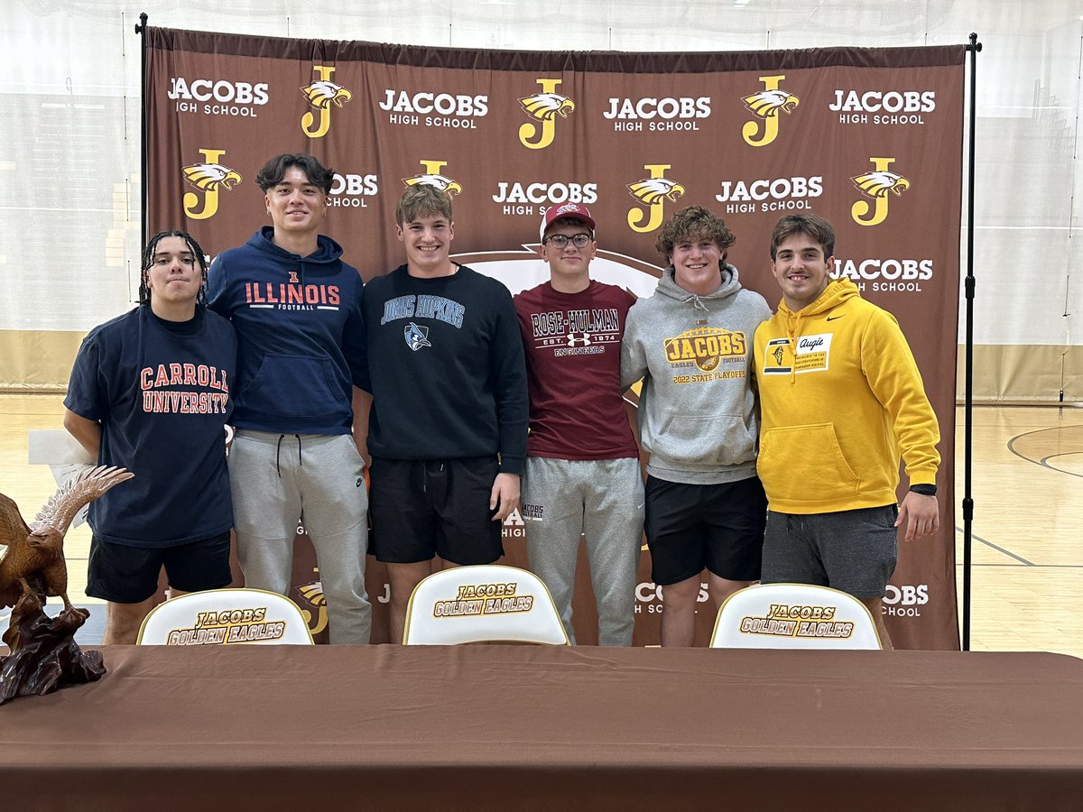 HDJacobsFBall's tweet photo. Celebrating today our 7 who will play in college🦅🏈
@NickTrue16 at @IlliniFootball 
@seibert_will at @JHU_Football 
@only1juan_ at @piofootball 
@dinohunt22 at @AugieILfootball 
@kyle_koziel75 at @AugieILfootball 
@dylan_c_35 at @RoseHulmanFB 
@_antoniobrown8  at @BSUBeaversFB https://t.co/Yja0Q6AaVq