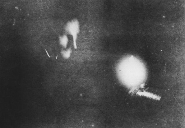 Physics Photo Of the Day:

Nikola Tesla's first ever photo under phosphorescent light, with it's source, one of his phosphorescent bulbs, January, 1894.