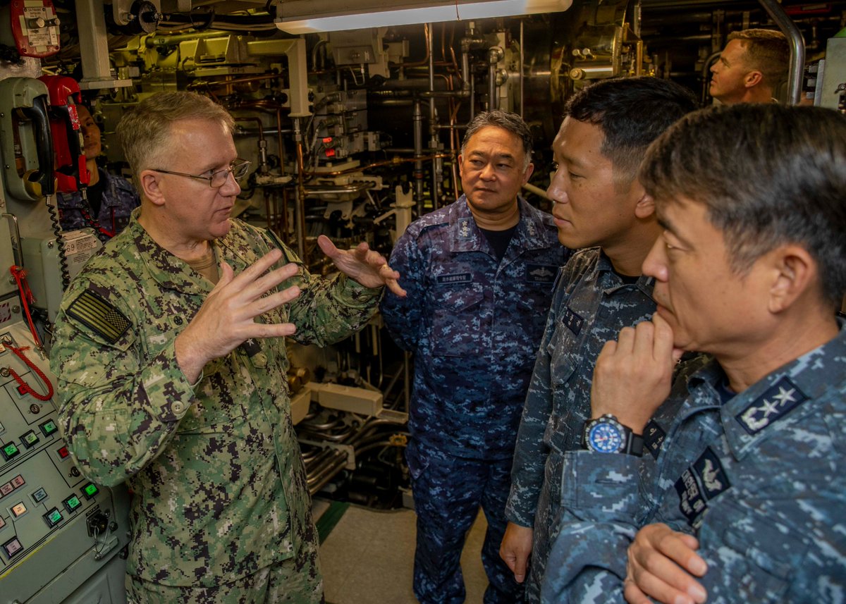 ryankakiuchan's tweet photo. US Rear Adm. Rick Seif joined by Japan Vice Adm. Tateki Tawara and South Korea Rear Adm. Su Youl Lee on USS Maine (SSBN-741) operating off Guam, April 18, first trilateral embark onboard ballistic missile submarine involving senior submarine fleet commanders of the three nations. https://t.co/pQ0ltHf4qs