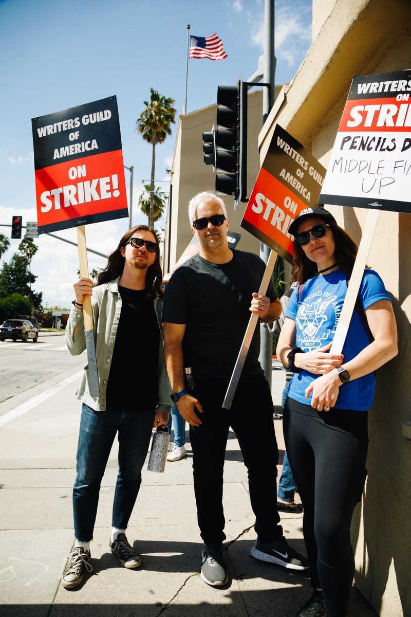 BrittWoodsy's tweet photo. I’ve been out walking with the @WGAWest at the picket lines and taking some photos. Here’s a few of my favorites from Day 1 when I was at WB. https://t.co/zUT0AG9cvt