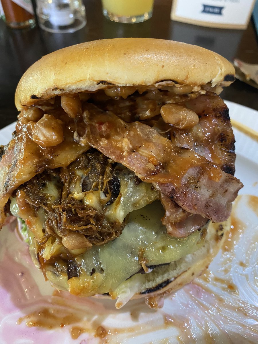 “Would you like BBQ beans with you burger sir” 

“Yes please”

What sane person puts beans in the burger.