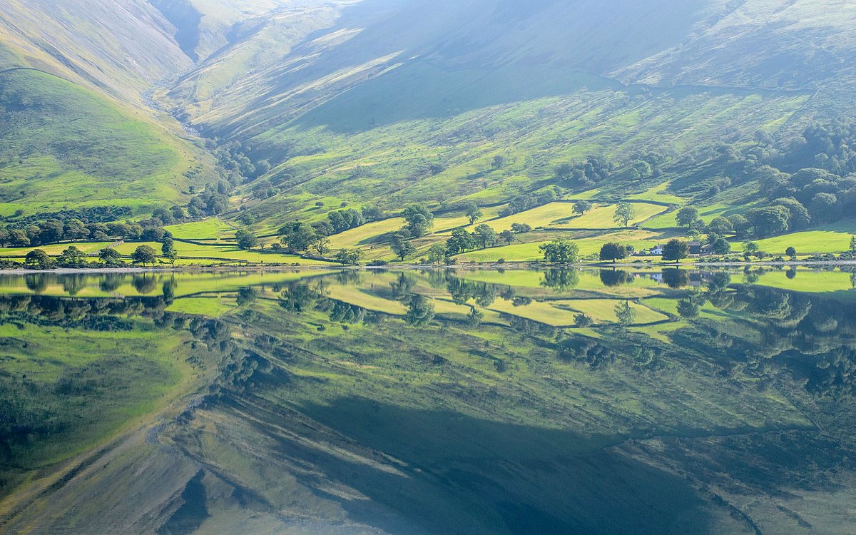 The hamlet of Wasdale Head reflected in Wastwater, Lake District National Park.
