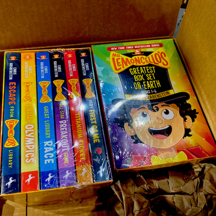CGrabenstein's tweet photo. A box of books arrived at our apartment and it was filled with boxes of books! The new LEMONCELLO box set will be available May 16th, too. It's enough to knock your glasses sideways! https://t.co/HpcDq90g00
@randomhousekids #mrlemoncello #boxsetrelease https://t.co/PjIDD7kpJp