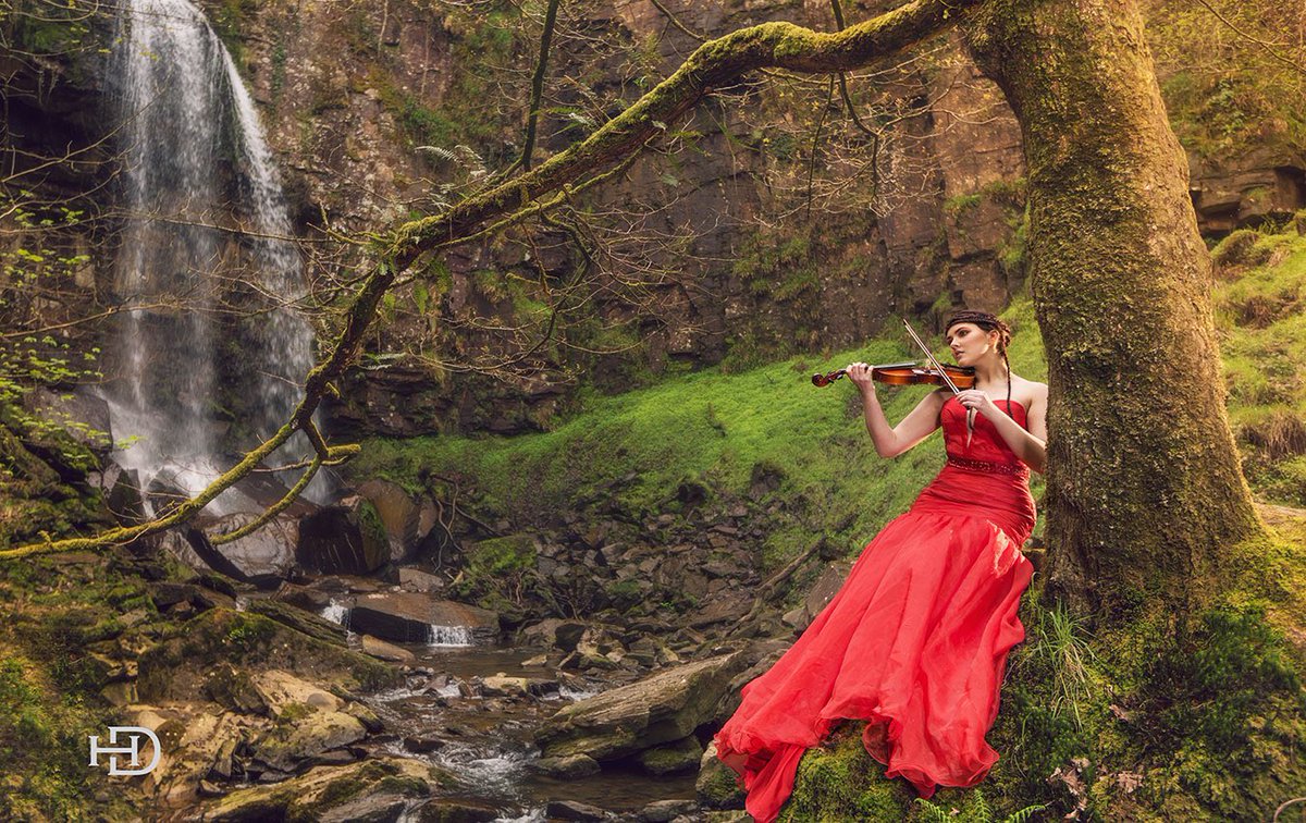 Welsh waterfalls with model Elle #photograghy #model #musician #waterfall #wales #beauty #photoshoot #location #RedDressDay #MayThe4thBeWithYou #landscapelovers #musicshower