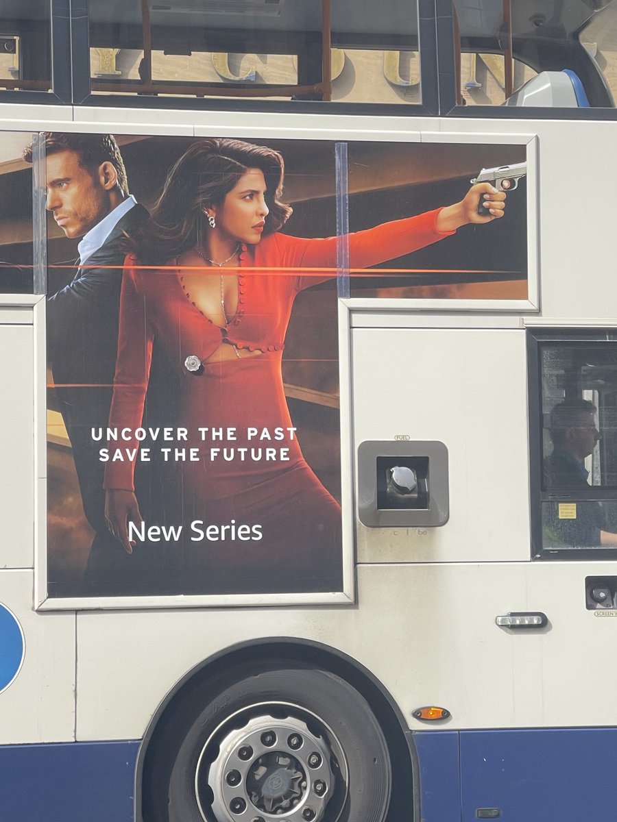 Here in England, female spies need only one button to keep it all together. Right.