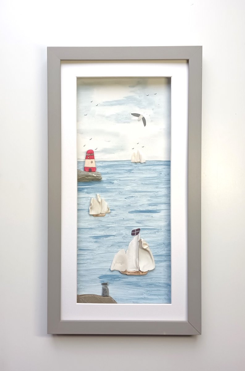 Beachstreetart's tweet image. There's a new tall ships picture available with sea shell sails and a sea pottery lighthouse #beachcombed #seashells #seapottery #coastal #wallart #cornwall etsy.com/uk/beachstreet…