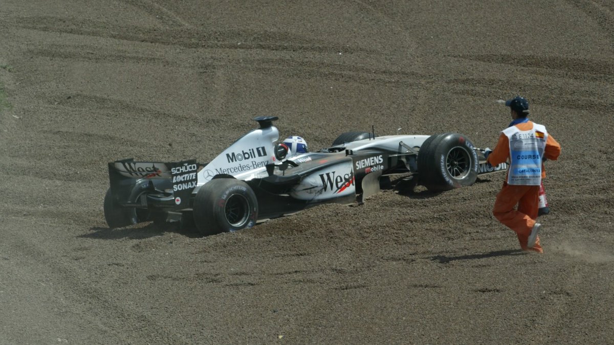 2003_f1's tweet photo. Melbourne seemed a long, long time ago when David #Coulthard had run into the back of Trulli's Renault, slid in the gravel trap &amp; the McLaren stayed there.

#SpanishGP 🇪🇸 4th May, 2003. (📸: LAT/Motorsport) https://t.co/msmPrWTok0