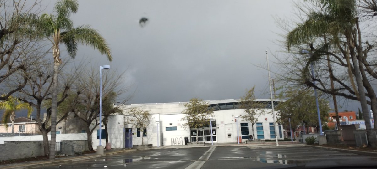 AscotLAPL's tweet photo. Rain storm trooping in over @AscotLAPL on Florence Av 
#LARain 
#MayThe4thBeWithYou https://t.co/6vTNM8yIox