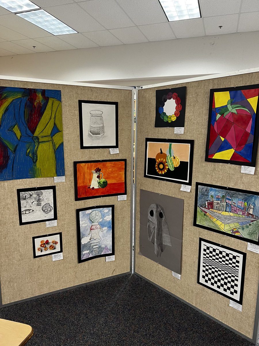 TGSPfeffer's tweet photo. Setting up for the Alumni visit this week! Welcome! Art show in the LMC. @gilbert_school #TGSNATION https://t.co/Dc0qWBl5AA