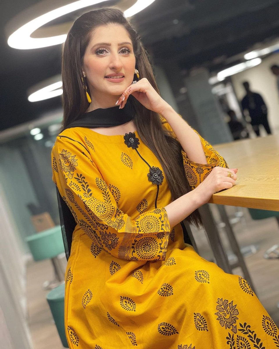 MediaSpringPk's tweet photo. BTS! @DrArooba1 stuns in a buttercup yellow outfit with black floral-inspired patterns as she graces the #OpenMicCafe set for a recording session. https://t.co/Glr9rGLCQw