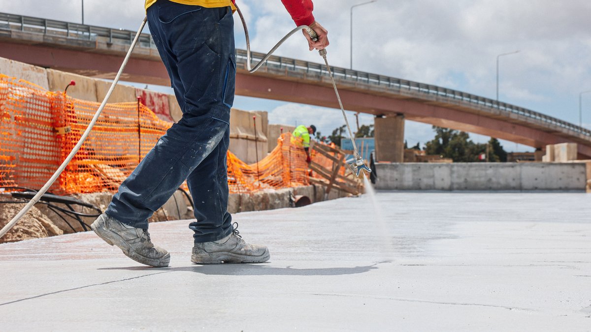 InfraMalta's tweet photo. 👷♀️ We are waterproofing the walls and roof of the new #LuqaJunctionProject underpass, shielding its concrete structure from humidity and water damage. #infrastructure4Dpeople #infrastructure4U https://t.co/yfkqspjQo2