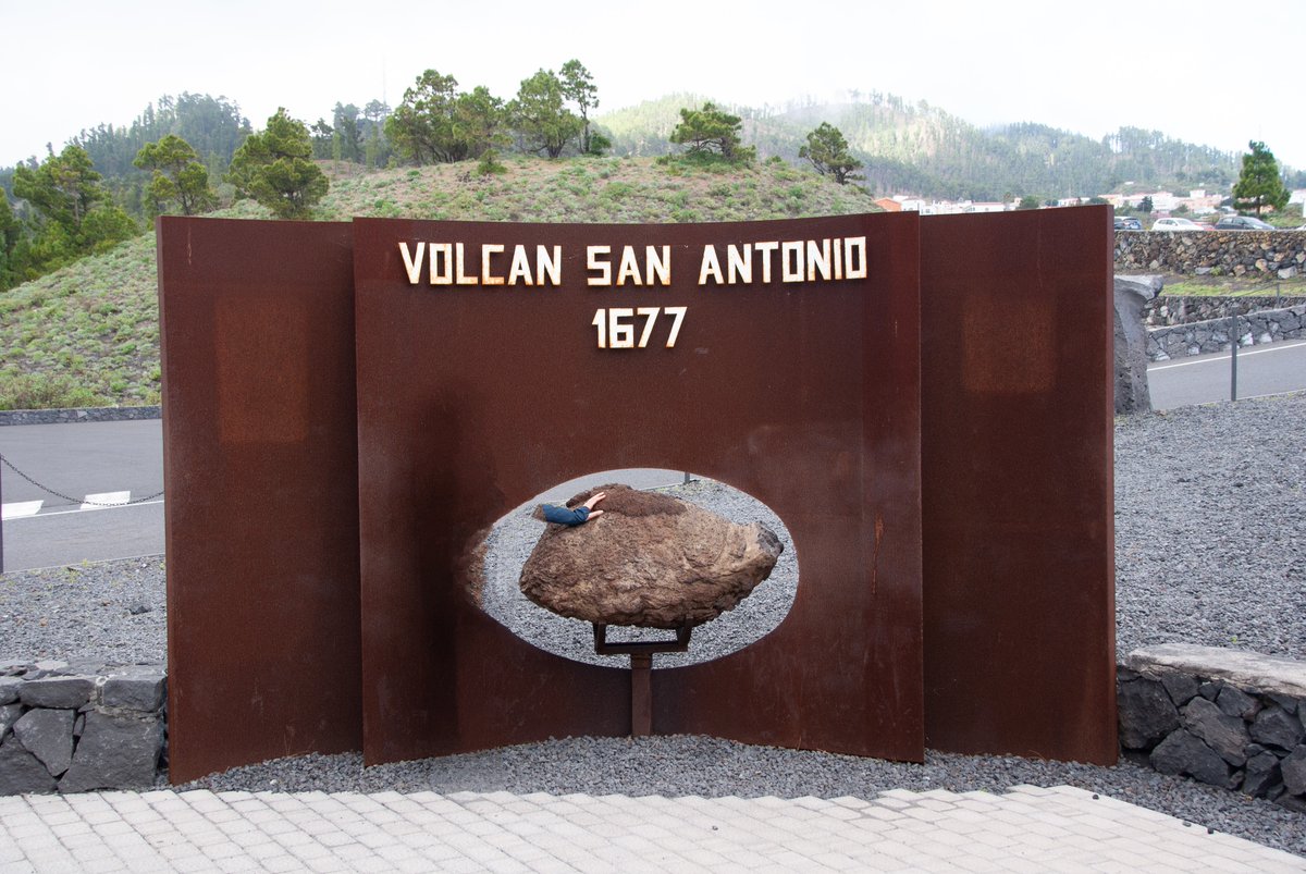GeologistsCat's tweet photo. Today is #VolcanoThursday & I found this picture taken on #LaPalma in front of the visitor centre that focusses on the 1677 #eruption of the #volcano #SanAntonio. At the entrance my humans found (it wasn't so difficult) this huge #LavaBomb.
Thanks to #AI:
Humans #PawForScale https://t.co/QwYoBiAM95