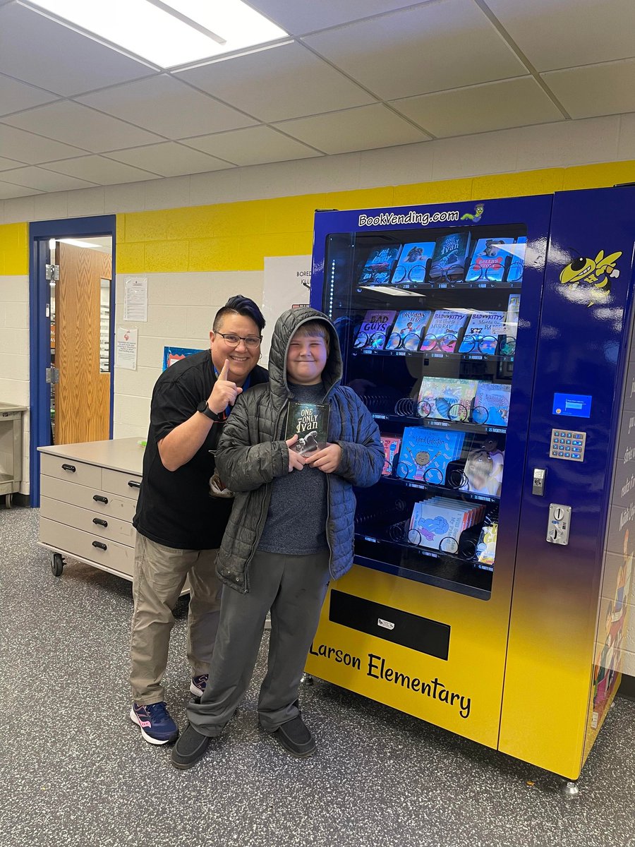 hmjensen31's tweet photo. The #larson455 book vending machine is up and running!! Our first reader could hardly wait for the shiny token so they could choose The One and Only Ivan @kaaauthor @MrSchuReads made sure to check to see if the back had Ivan's autograph to you and they were excited to see it! https://t.co/ehwmo4vqOg
