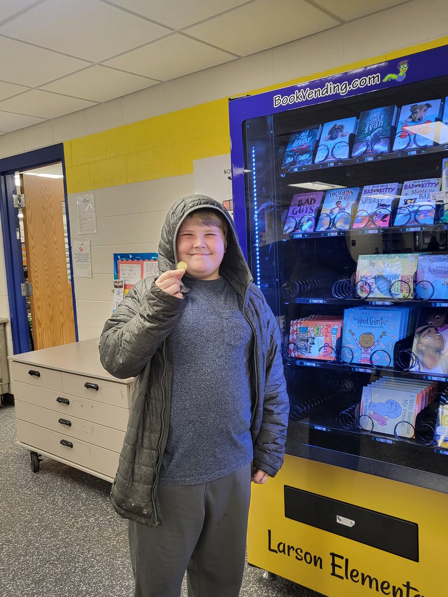 hmjensen31's tweet photo. The #larson455 book vending machine is up and running!! Our first reader could hardly wait for the shiny token so they could choose The One and Only Ivan @kaaauthor @MrSchuReads made sure to check to see if the back had Ivan's autograph to you and they were excited to see it! https://t.co/ehwmo4vqOg