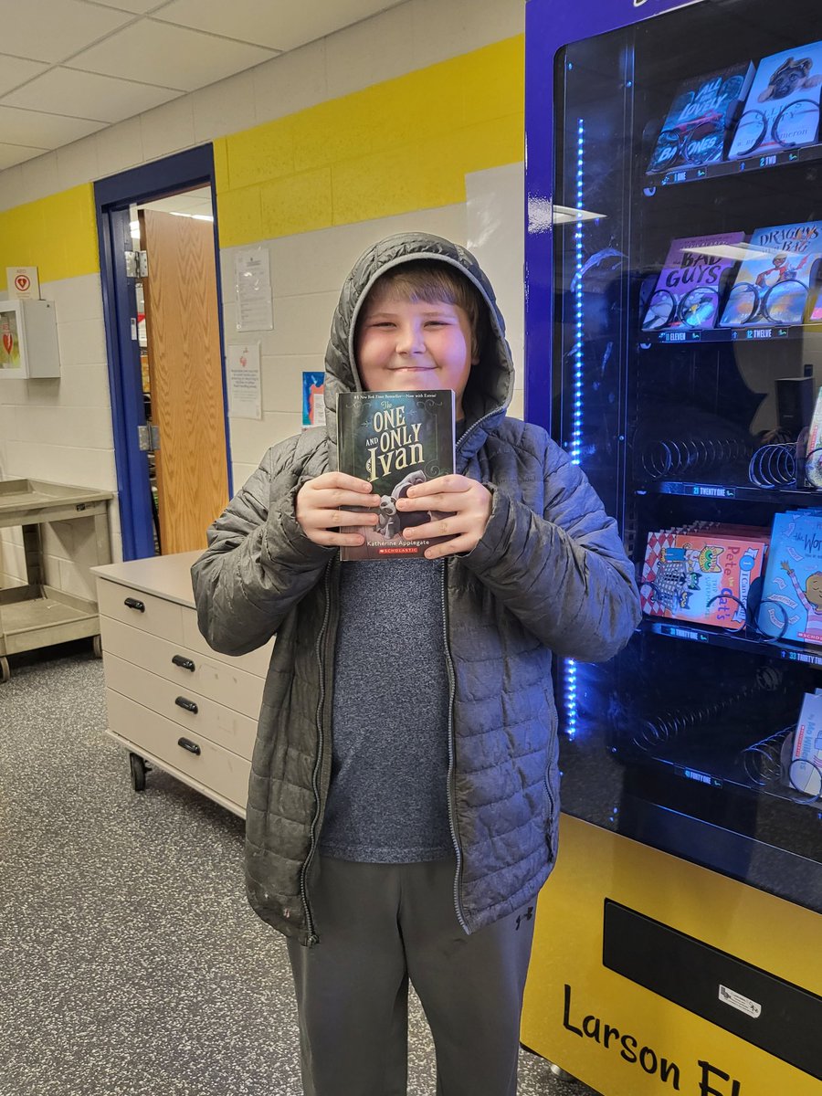 hmjensen31's tweet photo. The #larson455 book vending machine is up and running!! Our first reader could hardly wait for the shiny token so they could choose The One and Only Ivan @kaaauthor @MrSchuReads made sure to check to see if the back had Ivan's autograph to you and they were excited to see it! https://t.co/ehwmo4vqOg