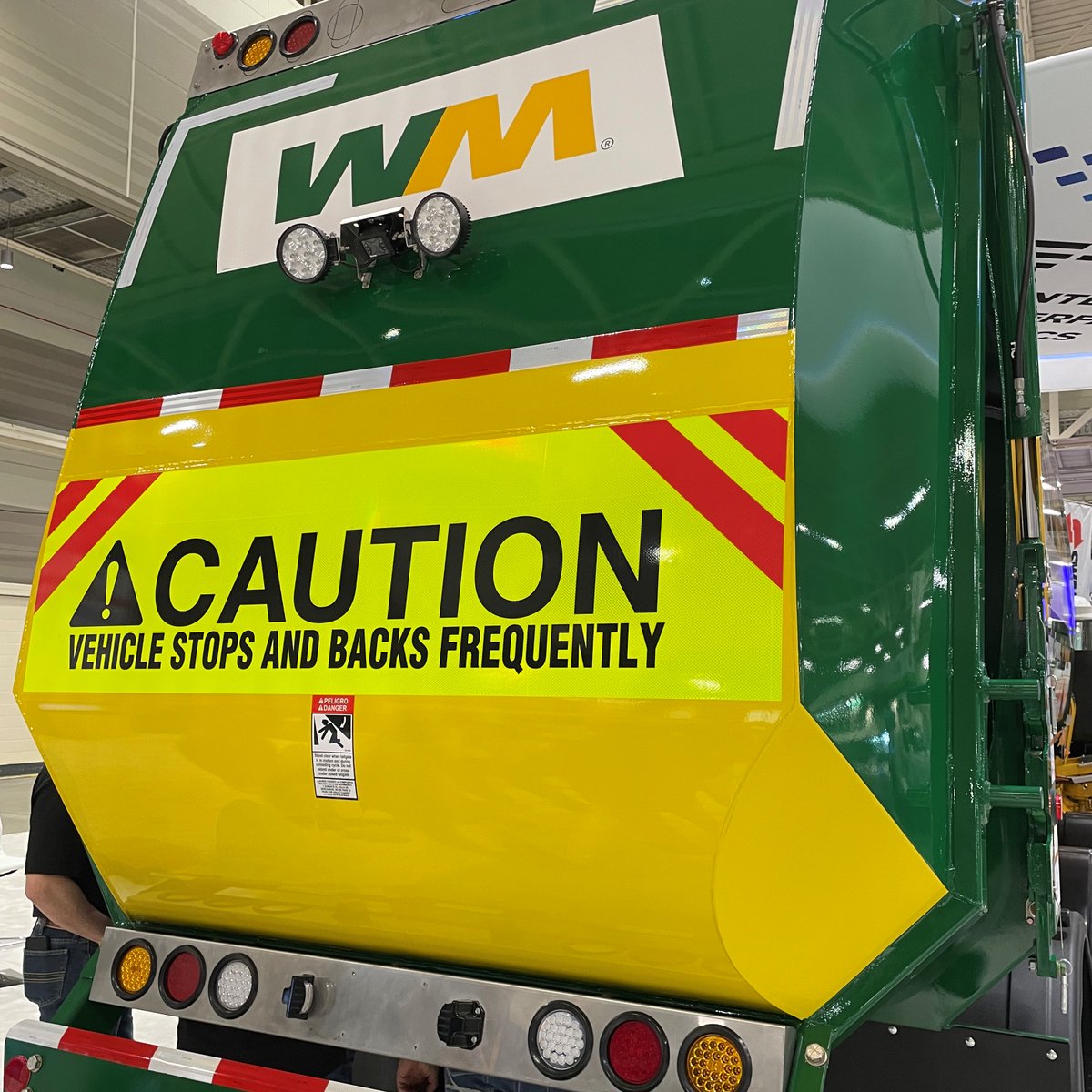 WasteManagement's tweet photo. An EV at #WasteExpo! WM is set to pilot this fully integrated electric Class 8 collection truck.

WM has been committed to alternative fuel options, including #RNG and electric vehicles as we work to reduce our overall emissions and help achieve our #sustainability goals. https://t.co/H2u8ETRrUE