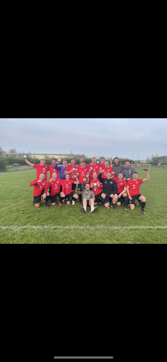 Saddleworth United are this season’s Division 3 Champions. The team is pictured with their Trophy and mementos. <a href="/sadd_united_afc/">Saddleworth United AFC</a>