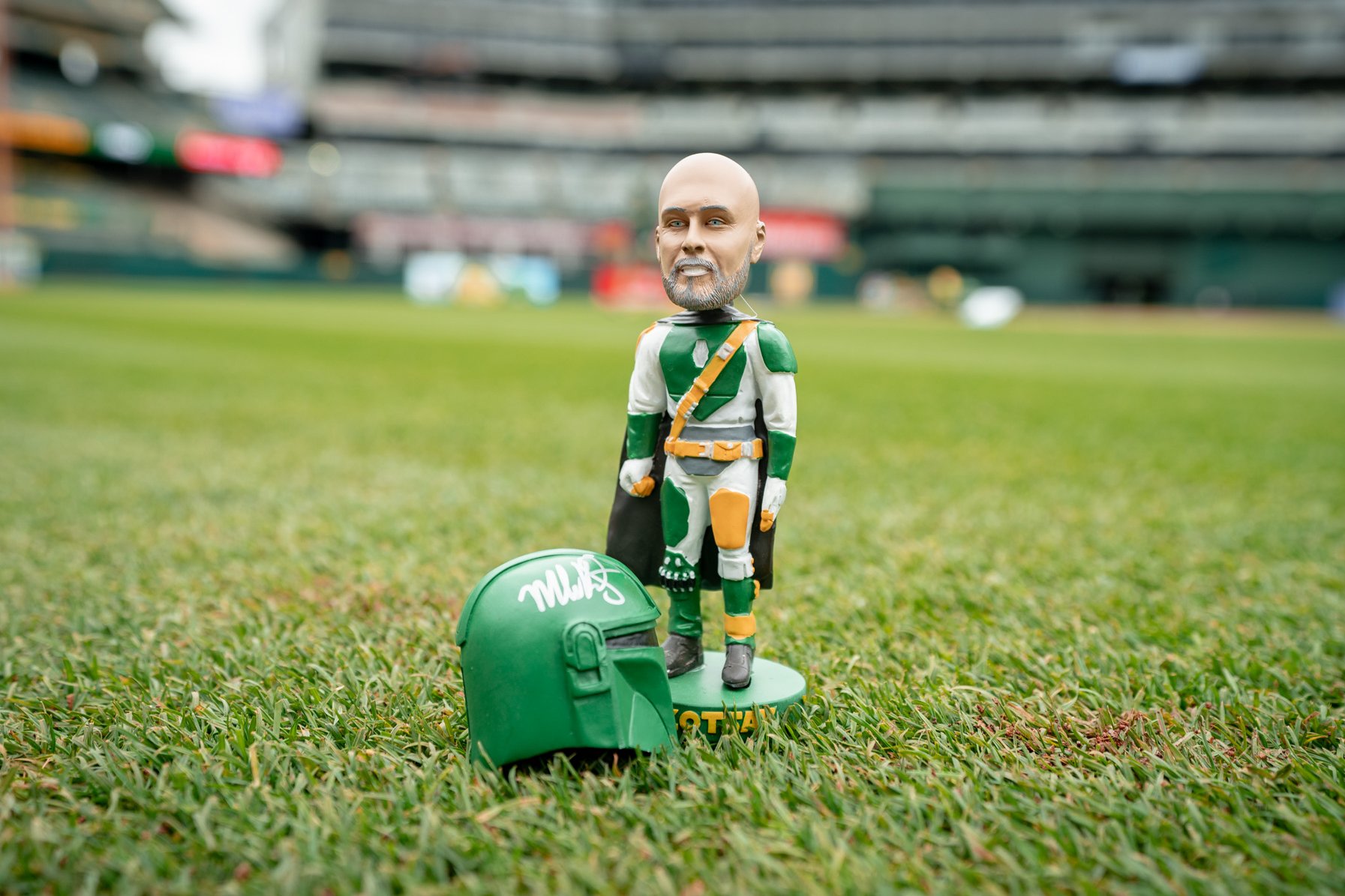 Mark Kotsay Mandalorian Bobblehead on the field, autographed on the helmet.