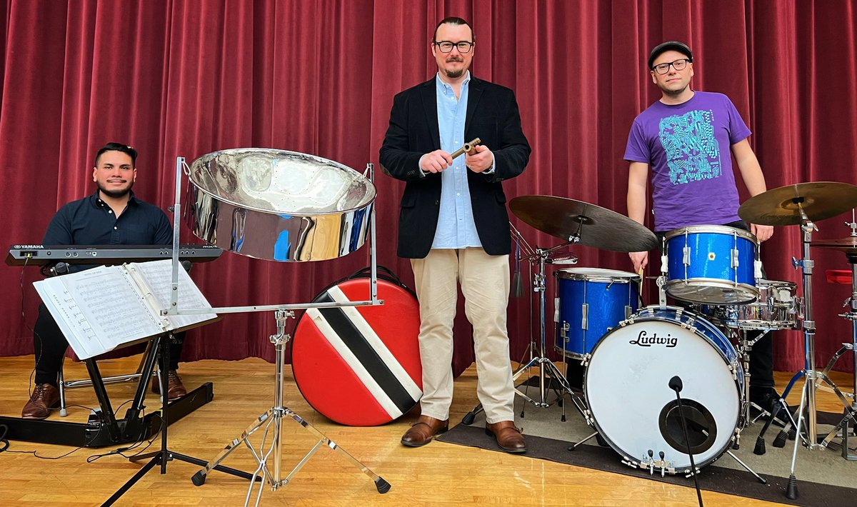 EricHines57's tweet photo. Eric Hines &amp; Pan Dulce Trio at Alexander Graham Bell Elementary School! 🇹🇹 🎶 

@chi_sinfonietta @TycoonPerc @panyardinc @vicfirth @SABIAN_Cymbals @drumdial https://t.co/DwX8kOIXTf