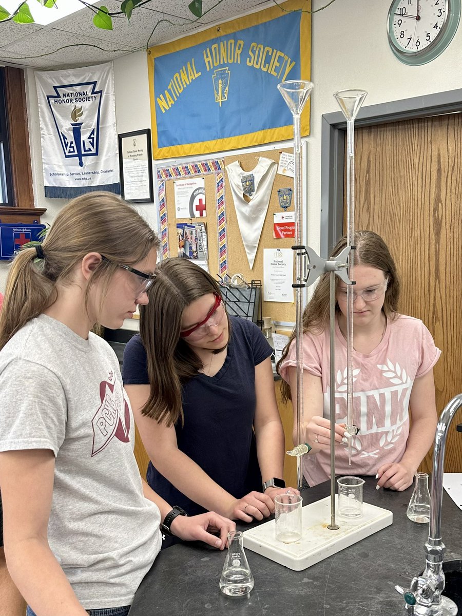 PCS_Pride's tweet photo. Chemistry:
Students are performing a titration lab with sodium hydroxide and hydrochloric acid. Phenolphthalein is the indicator that turns a light pink when the equivalence point has been reached. #handsonlearning #labskills #titrations https://t.co/1JuZlIHiC7