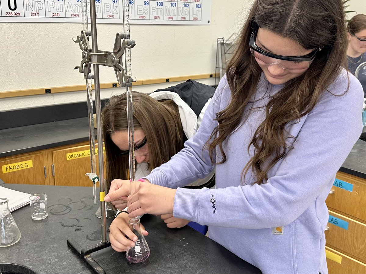 PCS_Pride's tweet photo. Chemistry:
Students are performing a titration lab with sodium hydroxide and hydrochloric acid. Phenolphthalein is the indicator that turns a light pink when the equivalence point has been reached. #handsonlearning #labskills #titrations https://t.co/1JuZlIHiC7