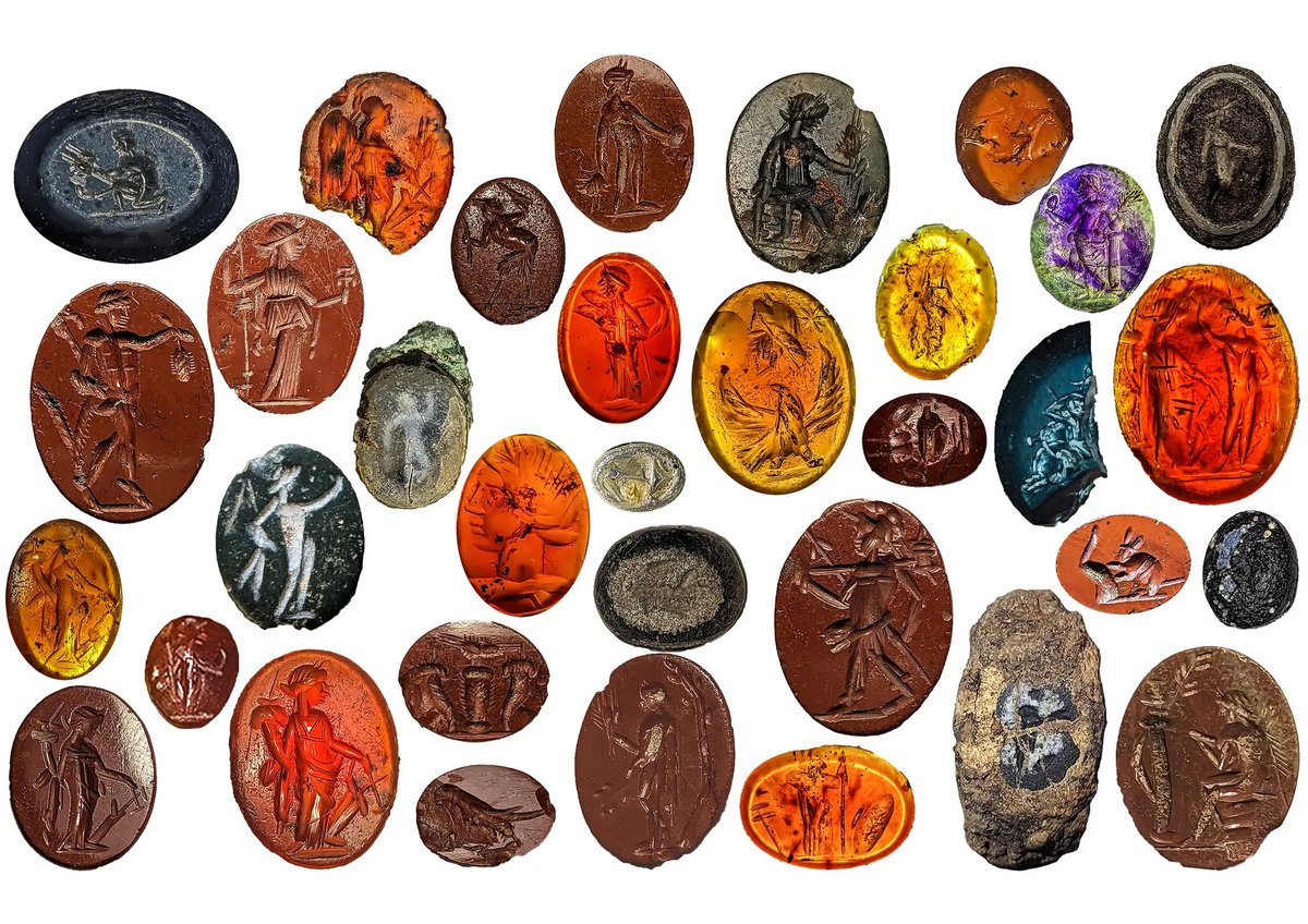 A dazzling collection of engraved semiprecious gems discovered in the drain of an ancient bathhouse at a Roman fort in Carlisle, England.

It is likely they fell from the rings or pockets of unlucky bathers!

#Classics #Roman #Art #History #England