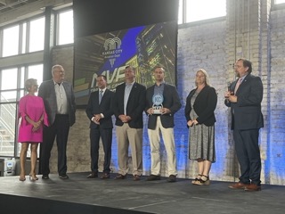 TeamKansasCity's tweet photo. @groupodell’s Maria & Dan O’Dell presented this year’s MVP Award to the KC Aviation Department. 🏆 Congratulations to the team on the successful opening of the new KCI Terminal! @Fly_KansasCity #FutureWorkKC https://t.co/rECL2sA5Ux