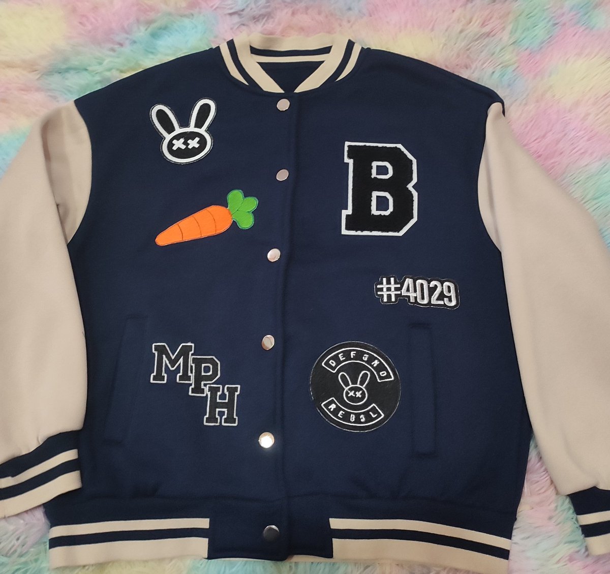 hoolimedia_eth's tweet photo. Trying to customize a varsity jacket in Bunni style! 🐰 #mypethooligan #karrotgang #hooligan #NFTCommunity https://t.co/GGlQuYzTkV