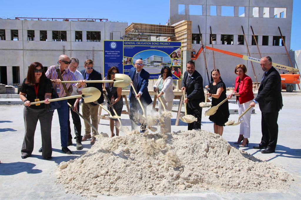 MDCPS's tweet image. Today at the #GOBProgress groundbreaking event at @AmmonsMiddle, @MDCPS began its $39.9 million investment for a new school that will include: a 3-story facility, labs, offices, restrooms, CCTV and access control systems, parent/bus drop off lanes, and more.