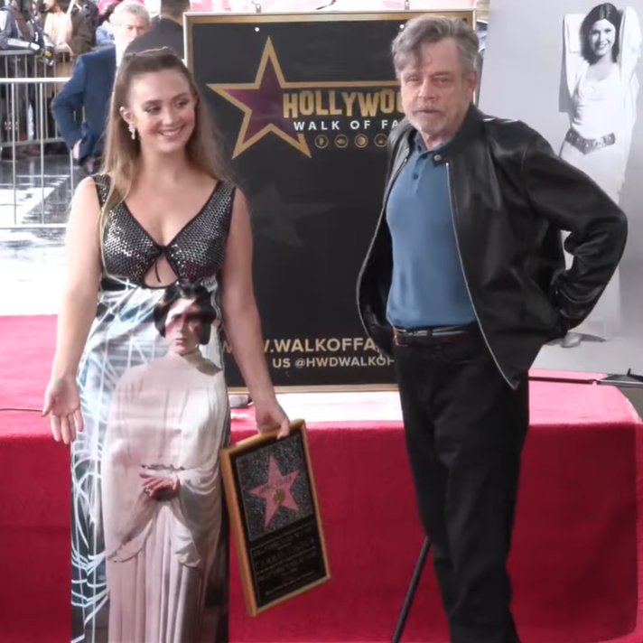 vadersanakin's tweet image. Billie Lourd and Mark Hamill posing in front of Carrie Fisher&apos;s star!!