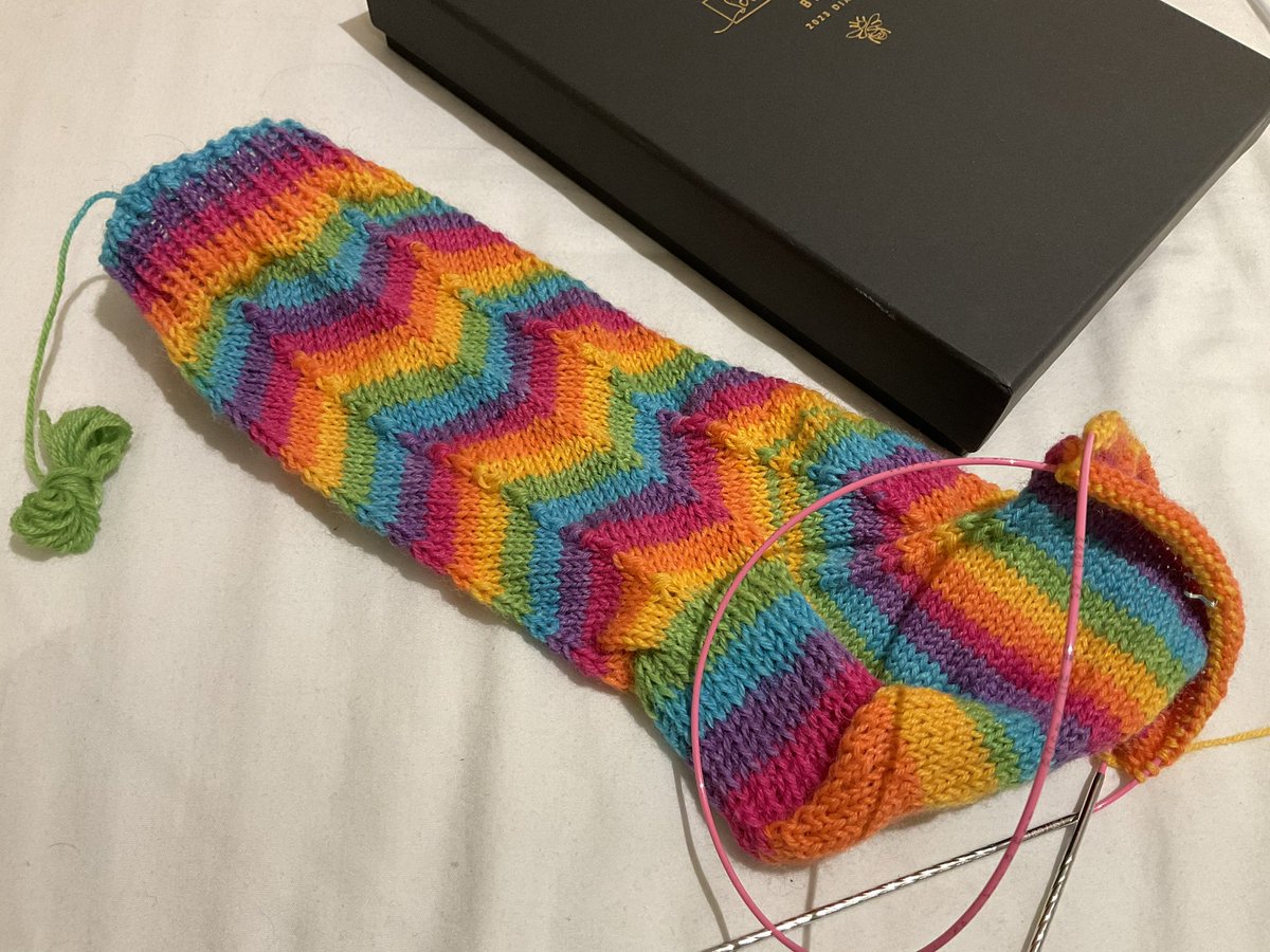 Today I am wearing my chevron rainbow socks. Still love this yarn. Are you wearing handknits right now?  #KnittingHour