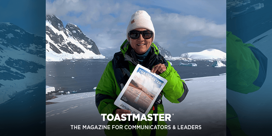 Toastmasters: Gaia Calcaterra, DTM, of Fort Lauderdale, Florida, holds a printed cover of the Toastmaster at Prospect Point in Antarctica. 
#toastmasters #antarctica  #btm #Toastmasters #Communication #Leadership