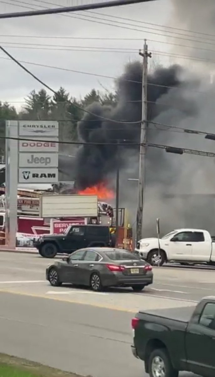 (OOA) Auburn, ME *WORKING FIRE* 765 Center St (Lee Auto Mall) - Fire in a car dealership, reported as Jeep/Chrysler/Dodge/Ram building, fire is now through the roof, mutual aid on scene, heavy delays on Route 4 with multiple lane closures - 5/4 - 17:00 #AuburnME #METraffic #Rte4