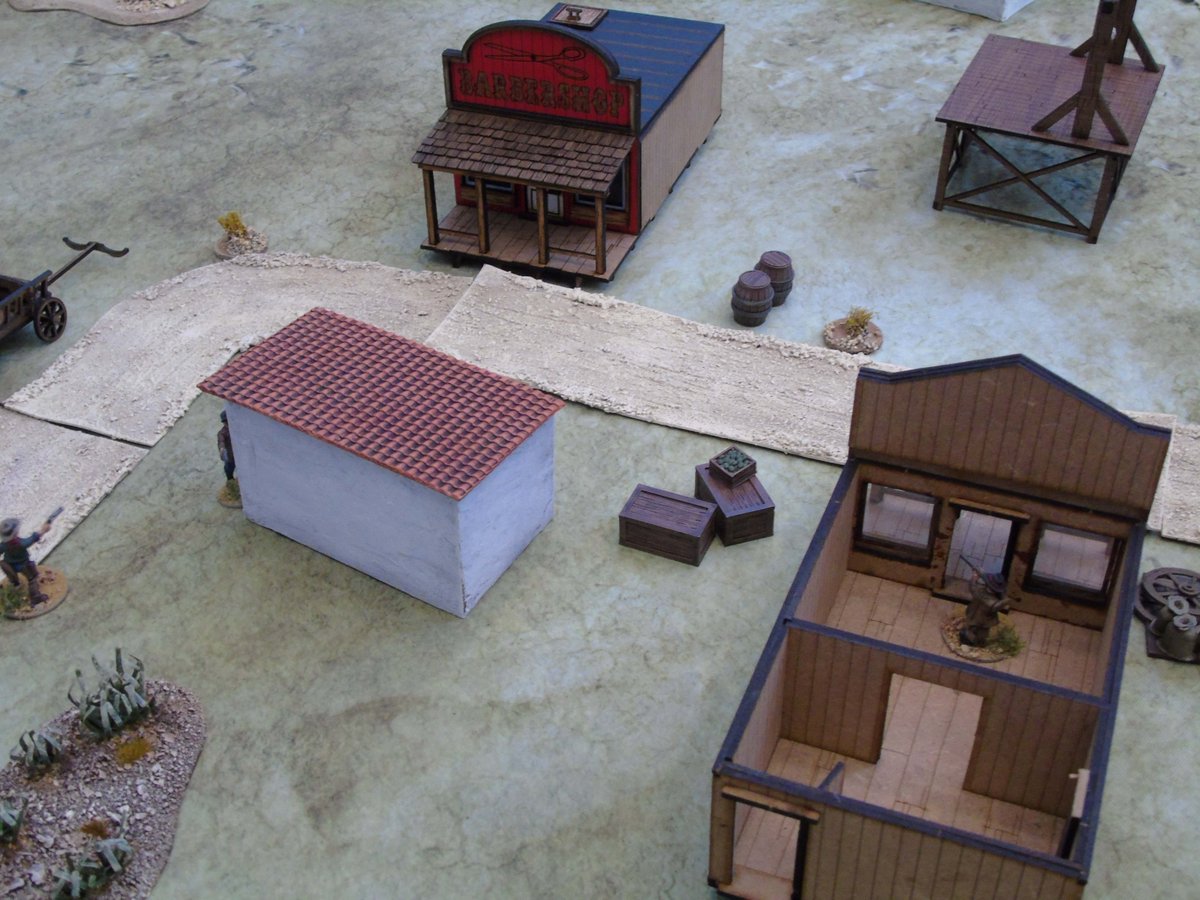 I set up my cowboy in the doorway of a shop and waited for someone to come into view #wargaming #tabletopgaming #tabletopgames #tabletopwargaming #WhatACowboy #twofatladies #history #historicgaming #28mmminiatures #28mmwargaming