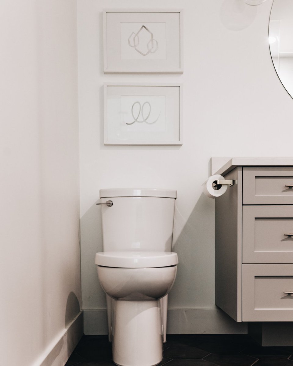 Transforming a bathroom into a luxurious retreat is all in the details. That's why we love this custom cabinetry project we did a while ago in natural wood color! The warm tones of the wood perfectly complement the sleek, modern design and create a cozy atmosphere that's perfect