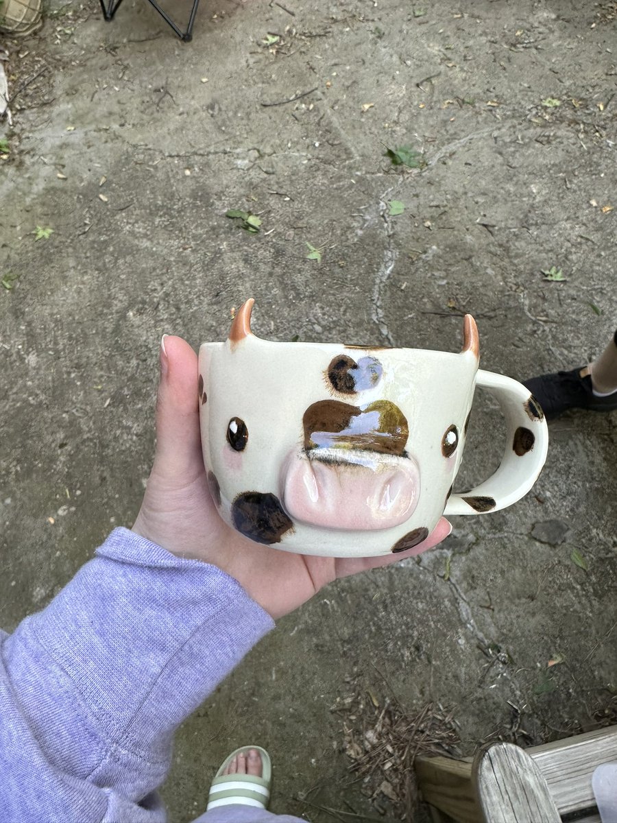 ChadBunn's tweet photo. More mugs that are done! The cow mug didn’t turn out with black spots for some reason? My guess was the clear glaze I put on it…? REGARDLESS THO! I’m happy with how they came out https://t.co/19IgiUG7dh